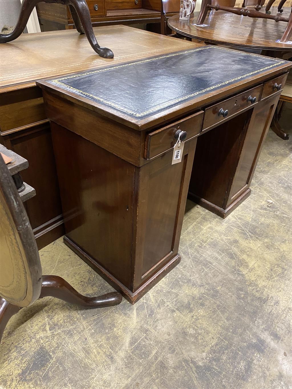 A Victorian mahogany kneehole writing table, width 102cm, depth 45cm, height 74cm
